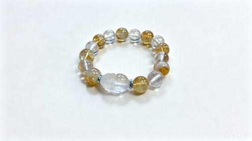 Citrine & Clear Quartz Pixiu Prosperity Bracelet — overhead studio shot on white